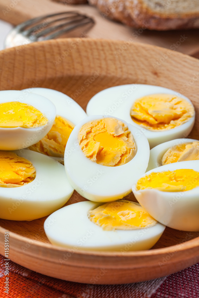 Half-boiled eggs in a wooden bowl. Half-boiled eggs in a wooden bowl.