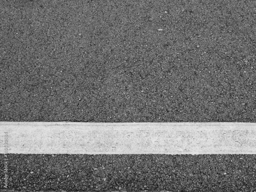 closeup new white line on the road texture