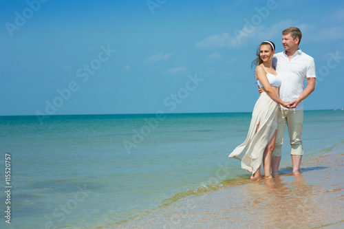 Young couple by the sea