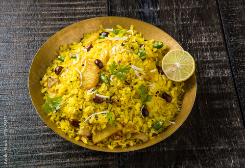 poha or aalu poha or pohe made up of beaten rice or flattened rice, favourite indian snack photo