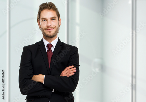 Handsome businessman full length portrait