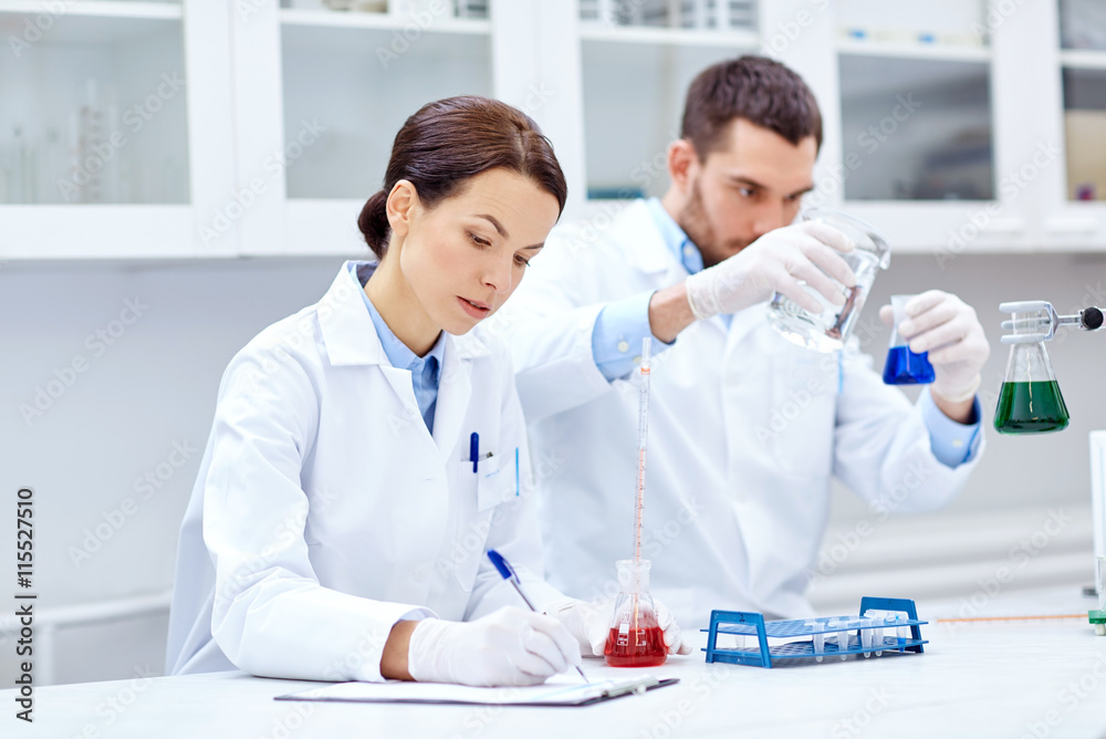 young scientists making test or research in lab young scientists making test or research in lab