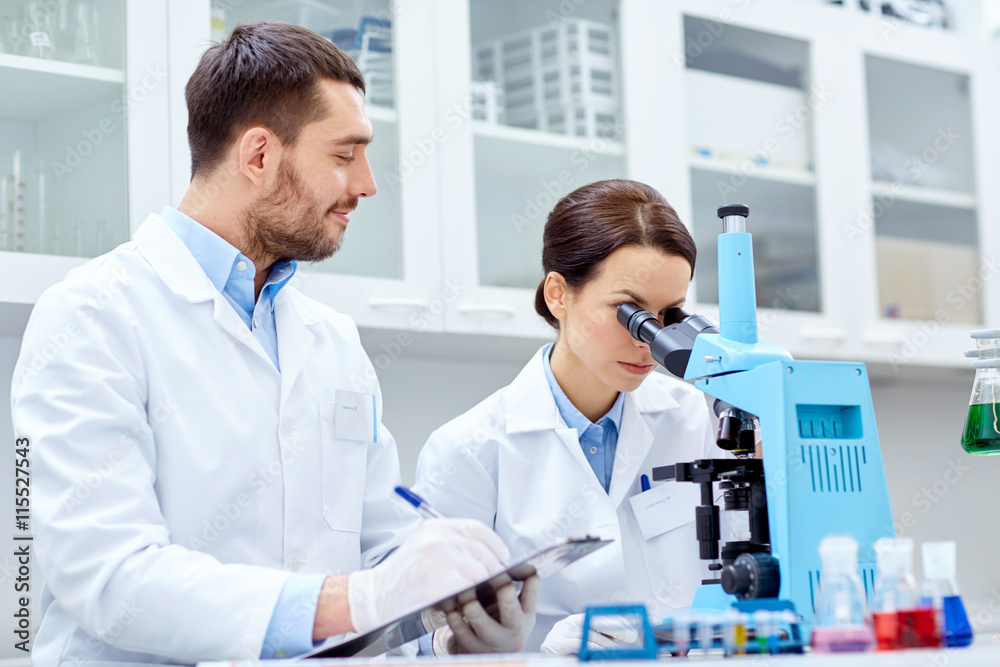 young scientists making test or research in lab young scientists making test or research in lab