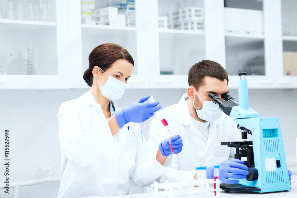 young scientists making test or research in lab young scientists making test or research in lab