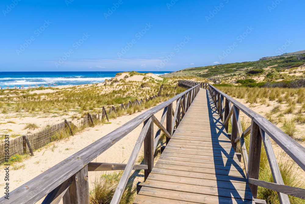 Foot bridge at Cala Mesquida - beautiful coast of island Mallorca, Spain Foot bridge at Cala Mesquida - beautiful coast of island Mallorca, Spain