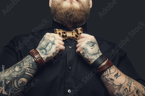 Fotótapéta Bearded male with tattooes on his arms.