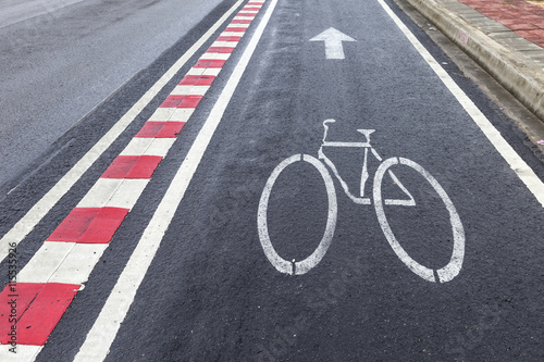 Wet Bicycle lane on the side of a highway in Thailand