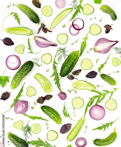 Fototapeta Naklejka Na Ścianę i Meble -  Fresh cucumber, onion, parsley, dill, basil and arugula on white