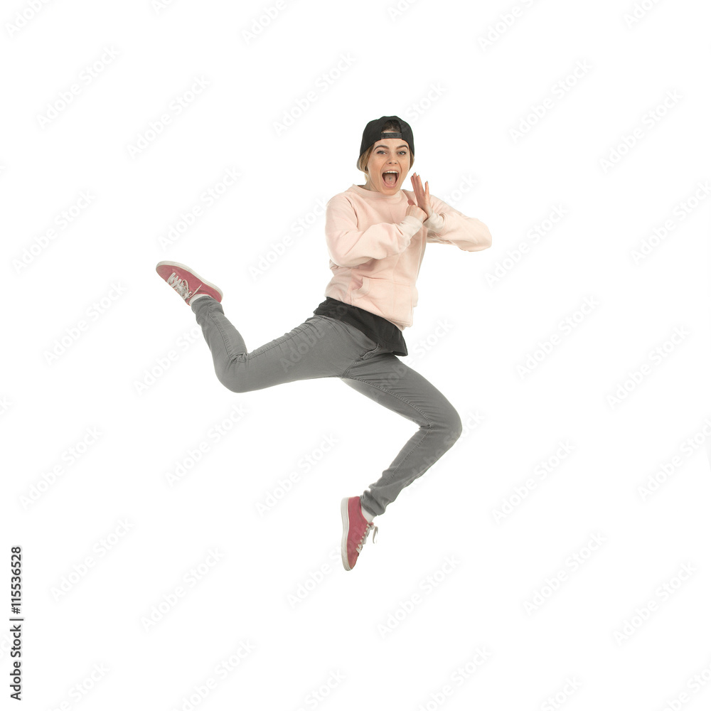 young blonde woman in studio jumping young blonde woman in studio jumping