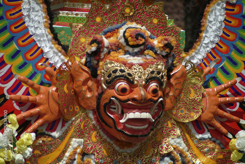 Balinese Cremation Mask. These colorful Hindu masks are hand made and play an important role in the traditional Balinese cremation ceremony. photo