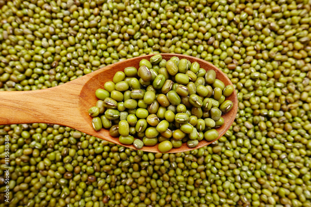 green beans with a wooden spoon 