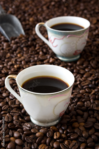 Coffee cup and coffee beans background