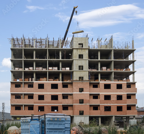 Separately located building under construction