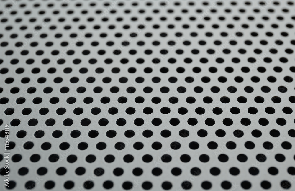 Metallic background with round holes Metallic background with round holes