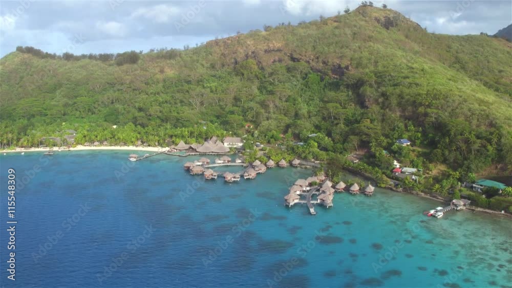 AERIAL: Deluxe beach hotel resort on exotic island Bora Bora AERIAL: Deluxe beach hotel resort on exotic island Bora Bora