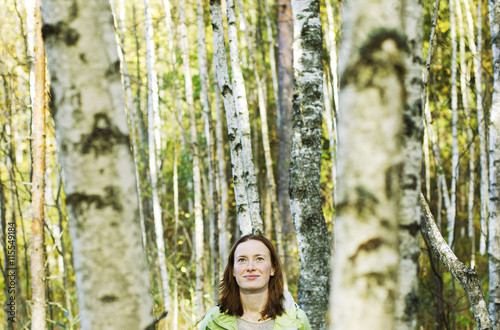 Finland, Heinola, Woman in forest photo