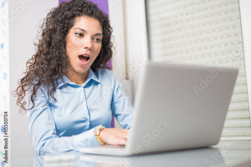 Suprised business women.