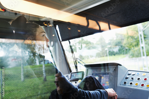 Sweden, Vastra Gotaland, Female tram driver seen through window photo