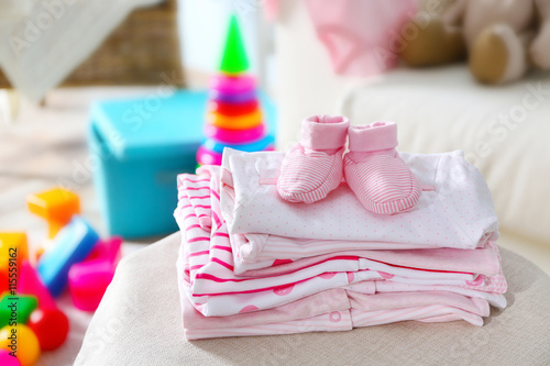 Pile of baby clothes, close up