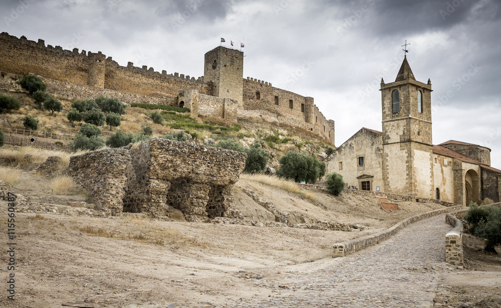 Medieval castle and Santiago church in Medellin Village, Badajoz, Spain