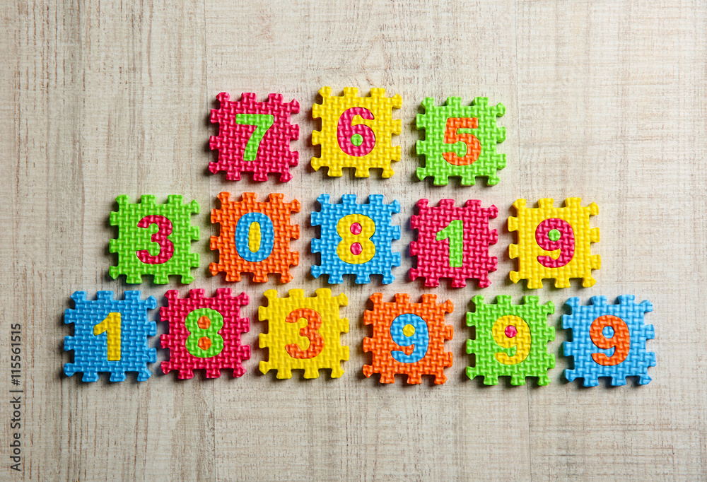 Colorful numbers on wooden table Colorful numbers on wooden table