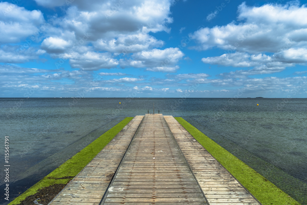Wooden old pier at Baltic sea