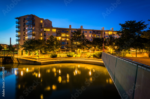 Building along the Ruoholahti canal at twilight, in Helsinki, Fi photo