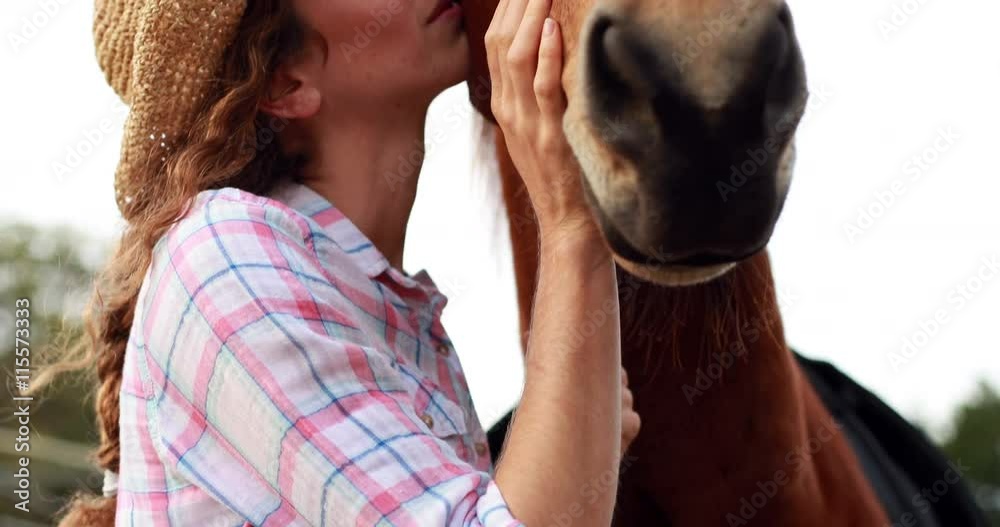 Woman walking with her horse in high quality 4k format