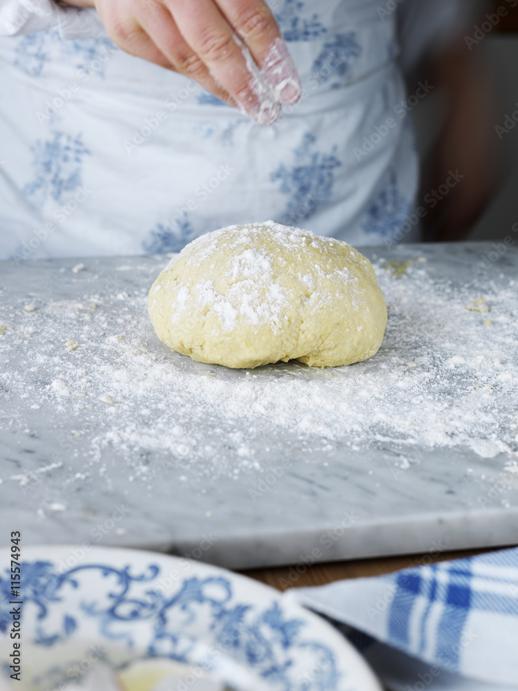 Sweden, Woman making pasta dough Sweden, Woman making pasta dough