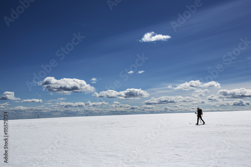 Sweden, Salen, Dalarna, Lindvallen, Skier in snowy plain photo