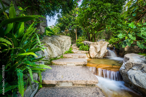 Steps and small cascading waterfall at Cheung Kong Park, Hong Ko