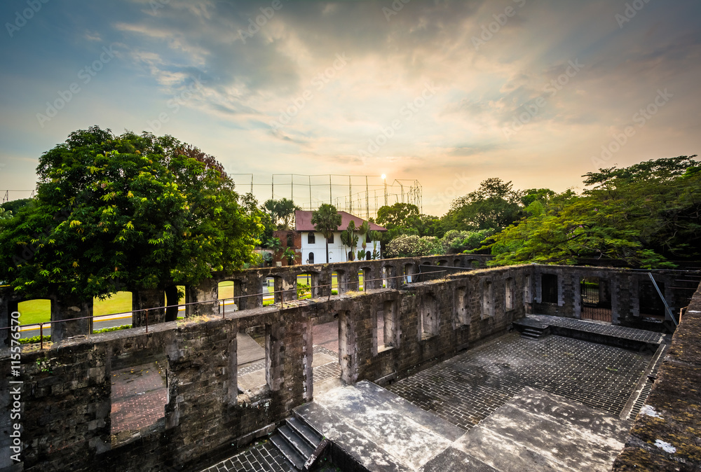 Sunset over the ruins of the walls at Fort Santiago, in Intramur
