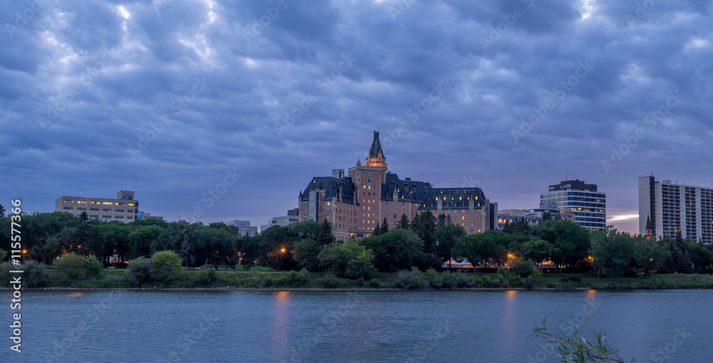 Saskatoon skyline at night along the Saskatchewan River. Saskatoon skyline at night along the Saskatchewan River.
