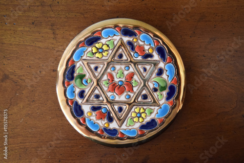 Decorative coaster with golden Jewish Star of David inlay