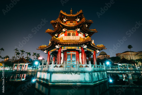 Traditional Chinese building and pond at night  at 2 28 Peace Pa