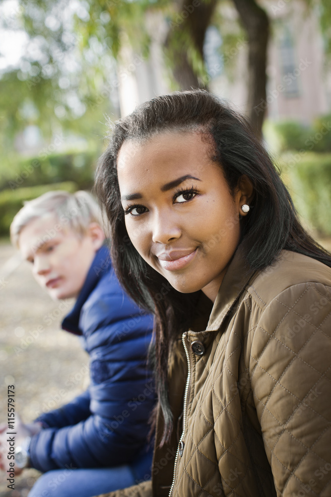 Sweden, Sodermanland, Strangnas, Portrait of teenage friends (16-17) in park Sweden, Sodermanland, Strangnas, Portrait of teenage friends (16-17) in park