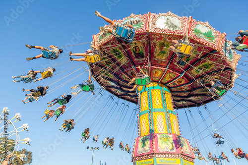 Tradional fairground ride, blue skies, summer fair