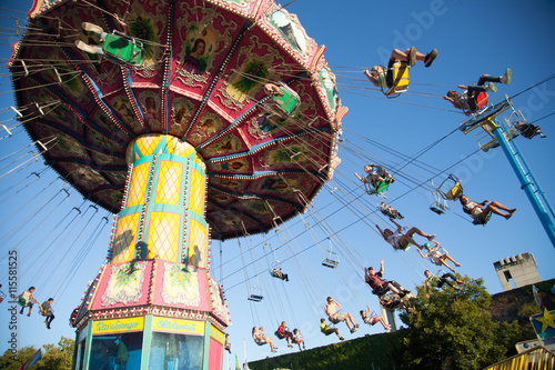 Tradional fairground ride, blue skies, summer fair