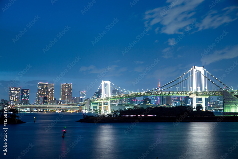 Tokyo city and rainbow bridge at twilight