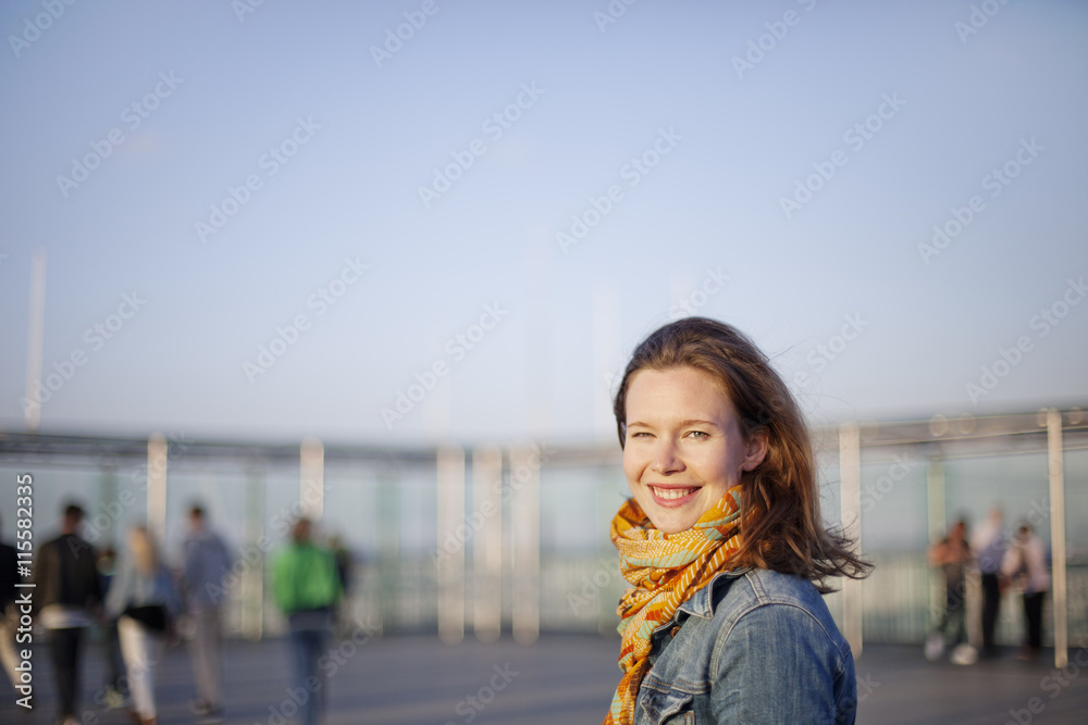 France, Ile-de-France, Paris, Smiling young woman France, Ile-de-France, Paris, Smiling young woman