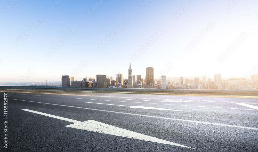 empty road with cityscape and skyline of san francisco at sunris