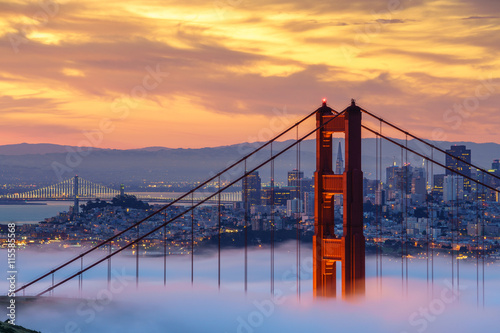 Canvas Print Early morning low fog at Golden Gate Bridge