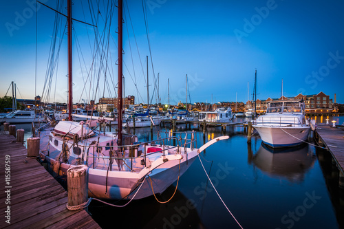 Boats in a marina at twilight, in Fells Point, Baltimore, Maryla