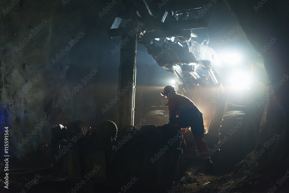 Sweden, Norrbotten, Kiruna, Miner working underground Sweden, Norrbotten, Kiruna, Miner working underground