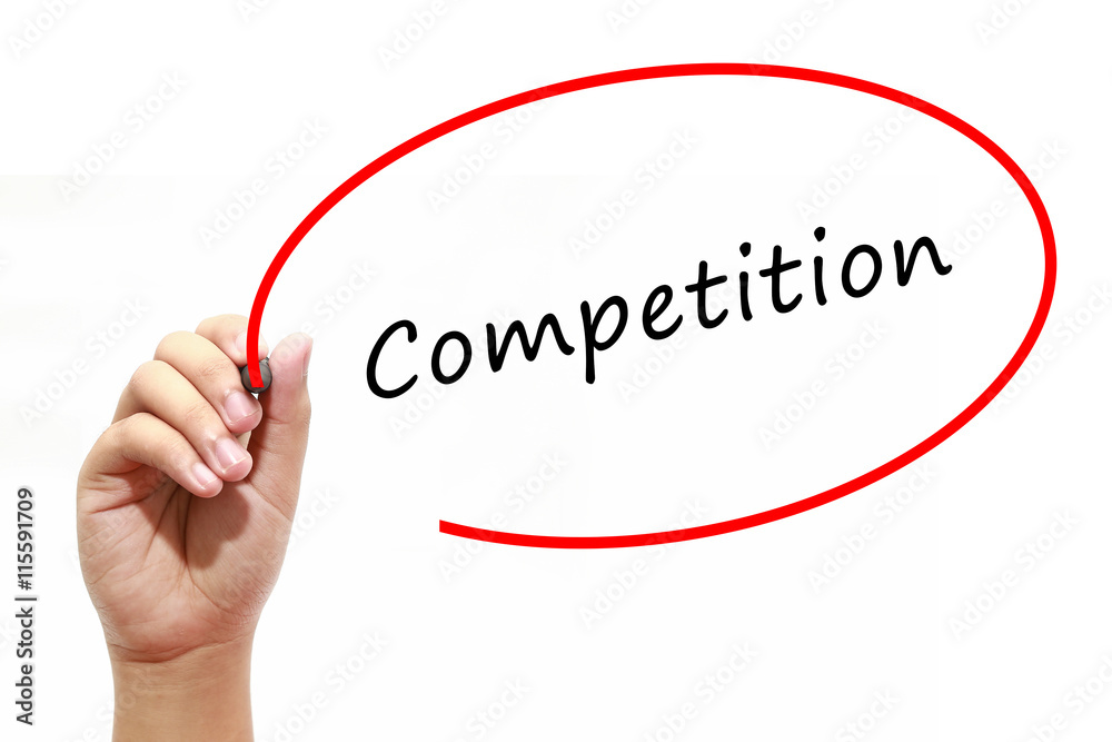 Man Hand writing Competition with marker on transparent wipe board. Business, internet, technology concept. Man Hand writing Competition with marker on transparent wipe board. Business, internet, technology concept.