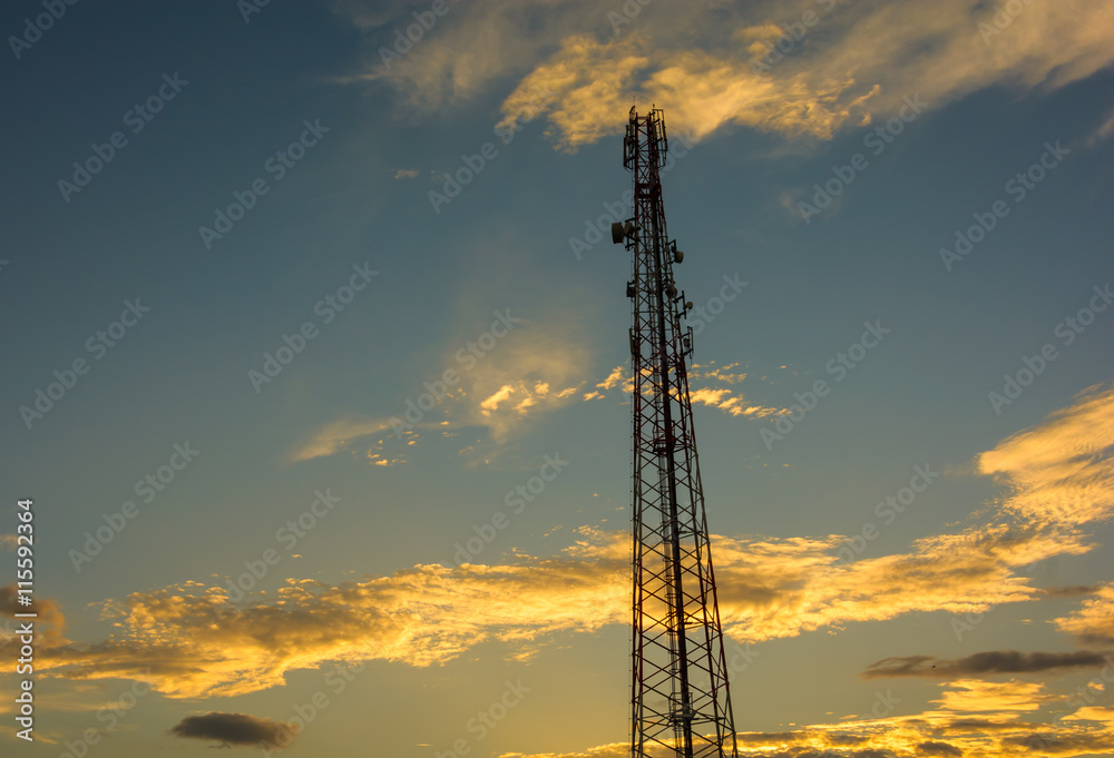 cell phone tower in sunset.