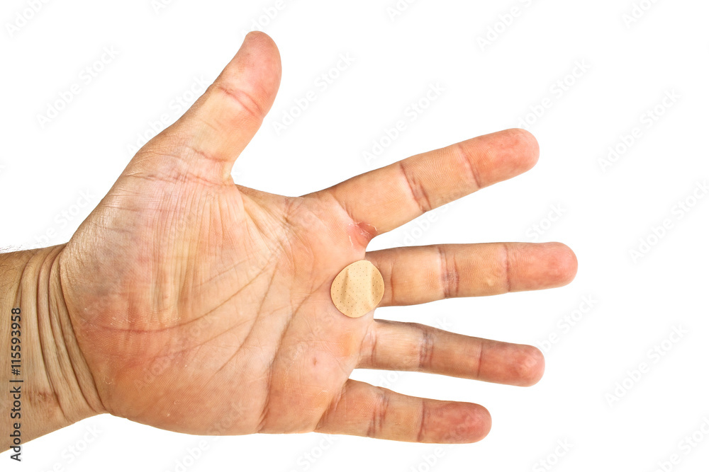 Men's hand with adhesive plaster isolated on white background Men's hand with adhesive plaster isolated on white background