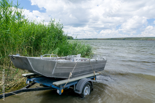 transportation of the boat on the trailer and descent in the water