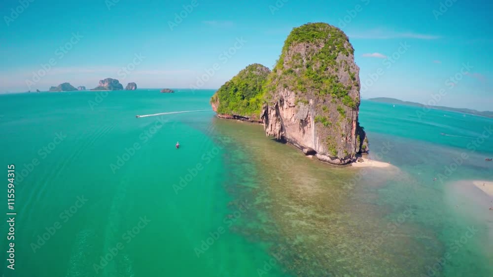 Aerial round 360 degrees view on tropical beach (Pranang beach) and rocks, Krabi, Thailand, 4k
Aerial round 360 degrees view on tropical beach (Pranang beach) and rocks, Krabi, Thailand, 4k