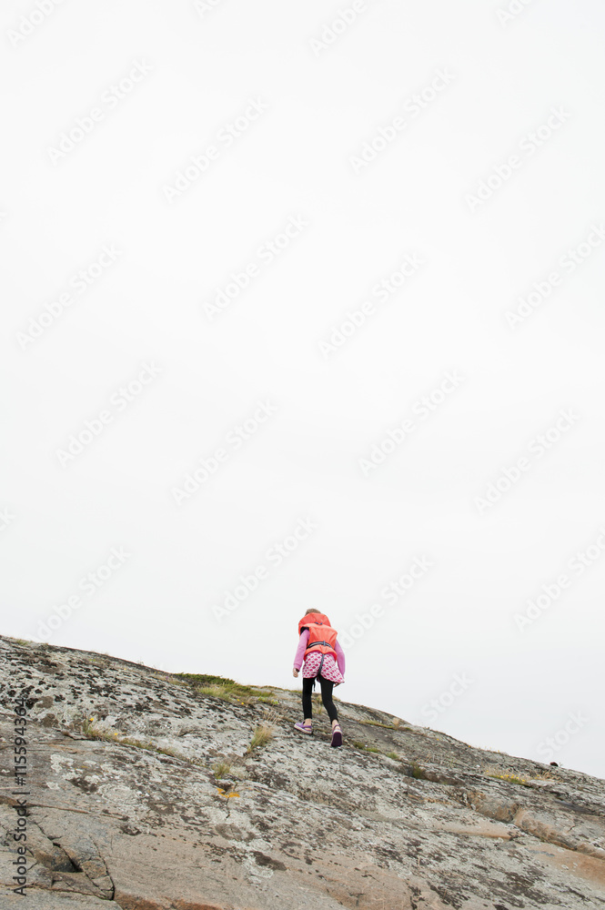 Sweden, Halland, Onsala, Girl (6-7) walking up hill Sweden, Halland, Onsala, Girl (6-7) walking up hill